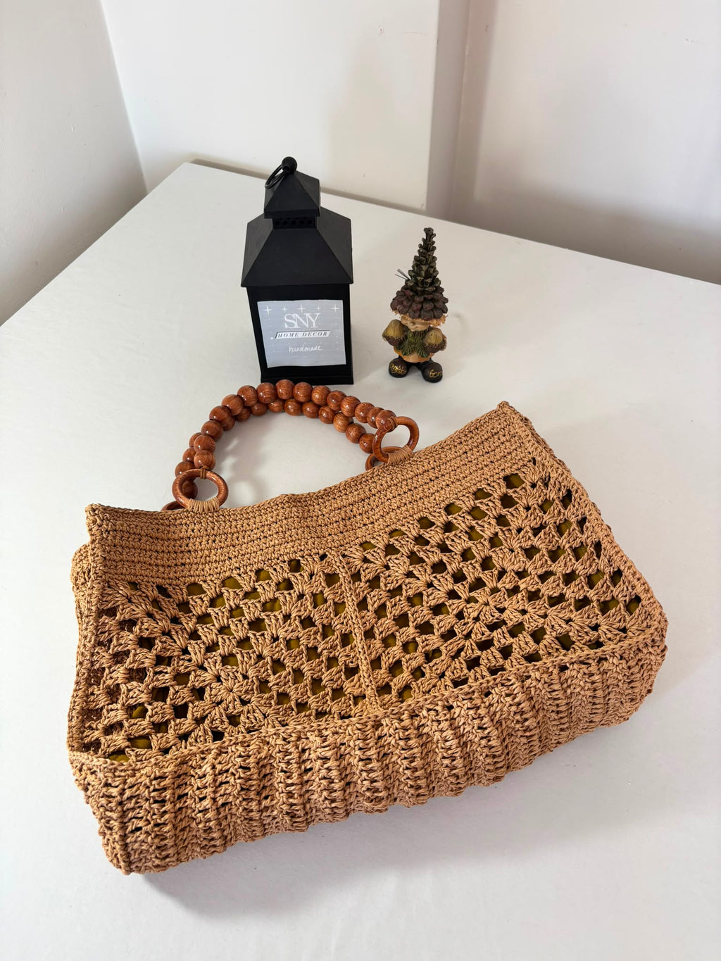 Boho style raffia shoulder bag handcrafted with premium raffia fiber, lightweight and ideal for vacations and travel.