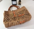 Stylish handmade summer tote bag crafted from natural raffia, perfect for beach outings, markets, and casual wear.