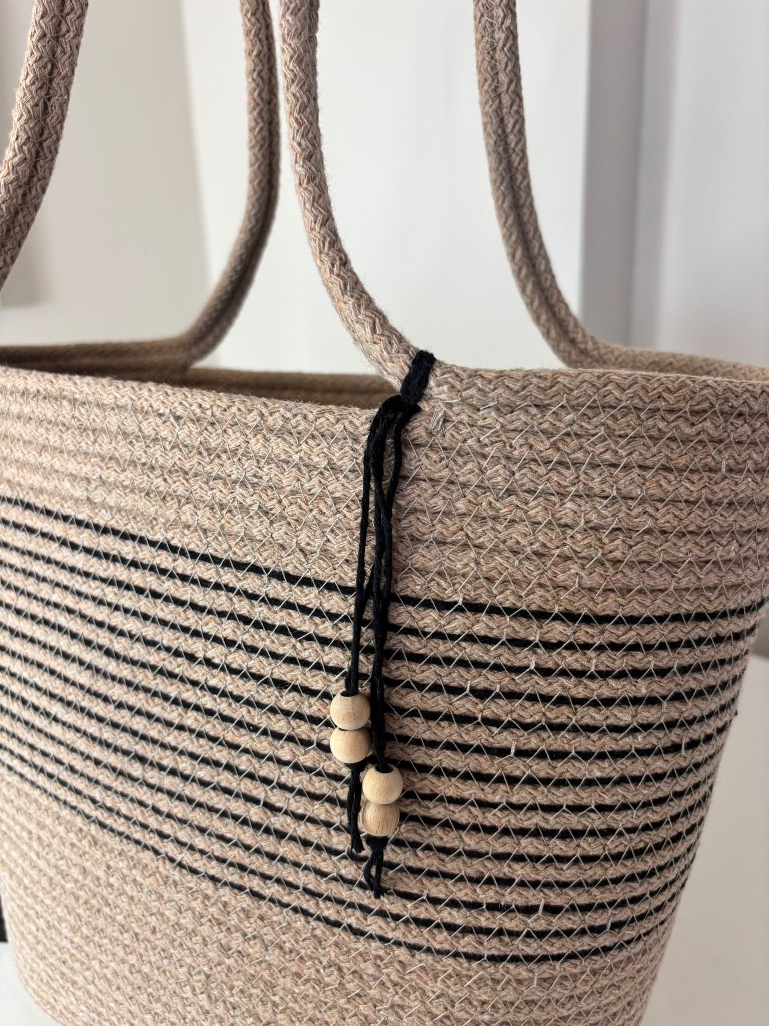 Large woven beach tote bag for women in beige and black