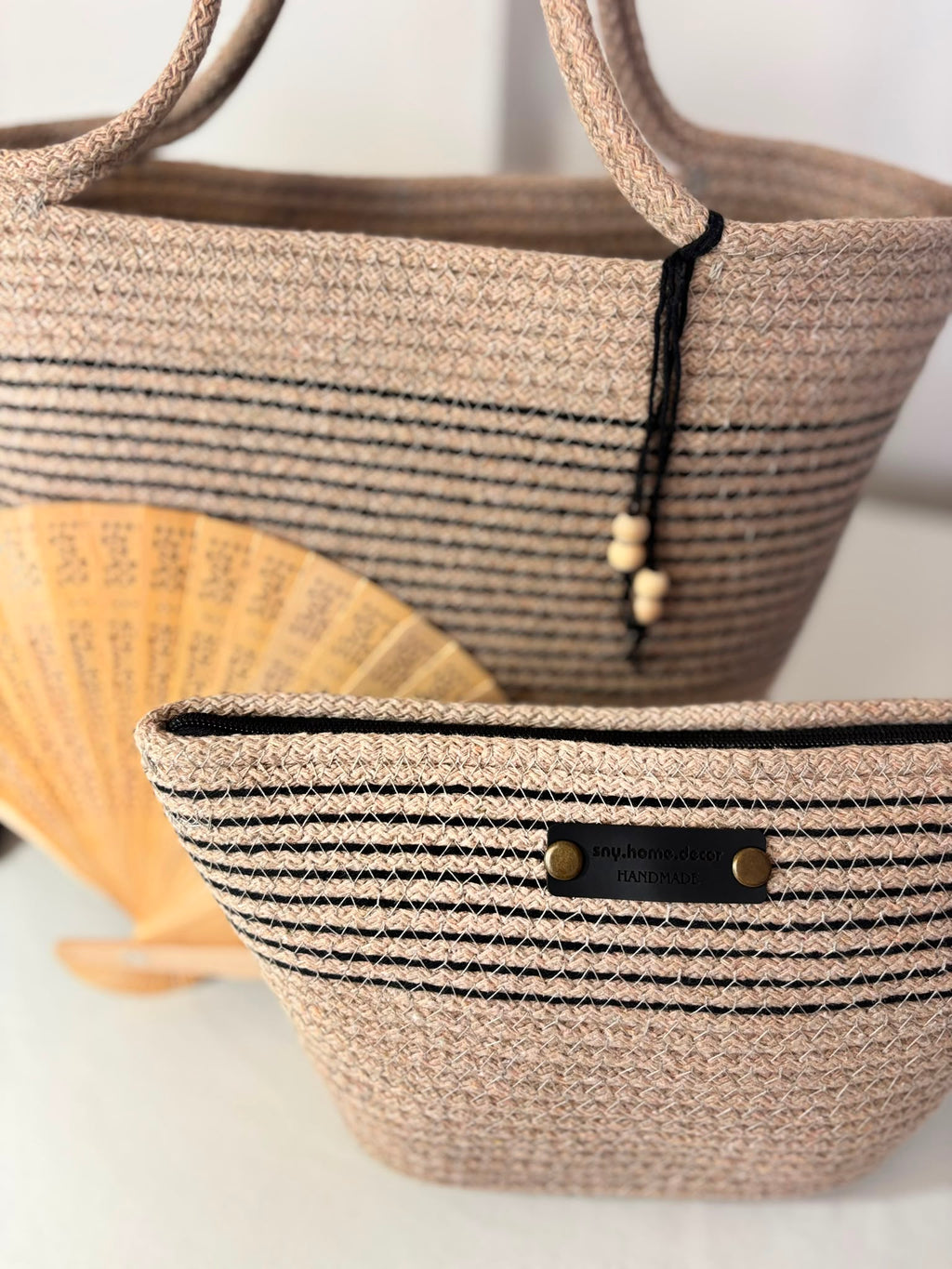 Large woven beach tote bag for women in beige and black